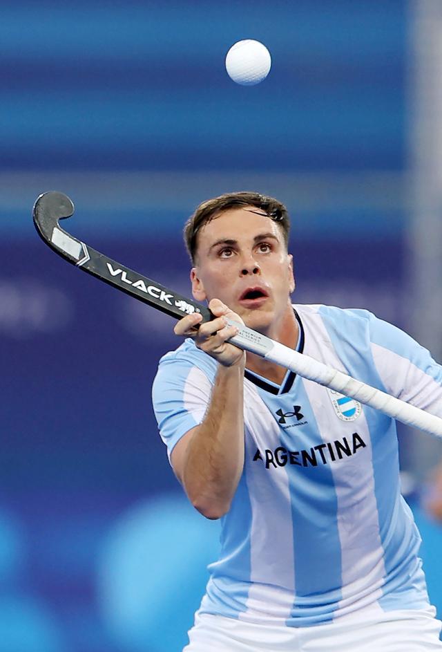 阿根廷男子曲棍球队紧逼对手取胜